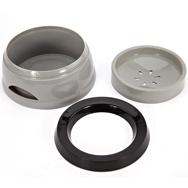 The no-spill bowl taken apart: base bowl, floating plate and tapered rim