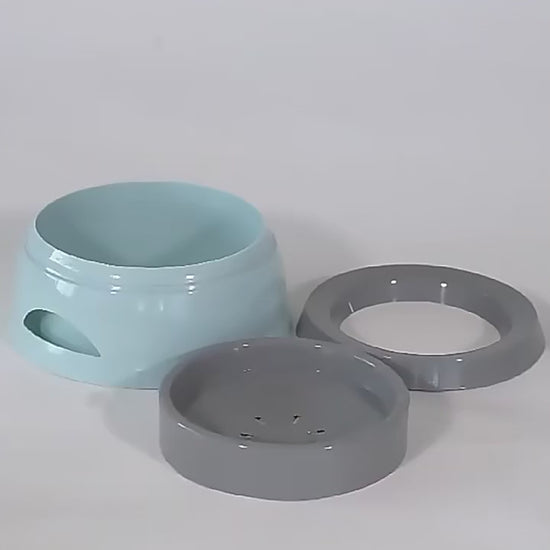 Demo of the no-spill bowl being put together, filled with water and tilted without spilling over the rim